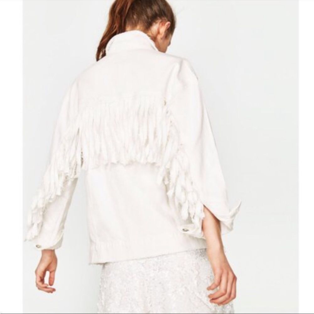 Distressed white denim jacket